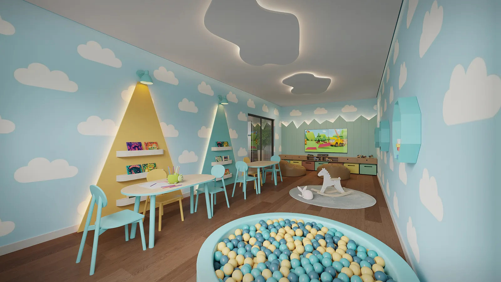Espaço kids com piscina de bolinhas e mesas infantis